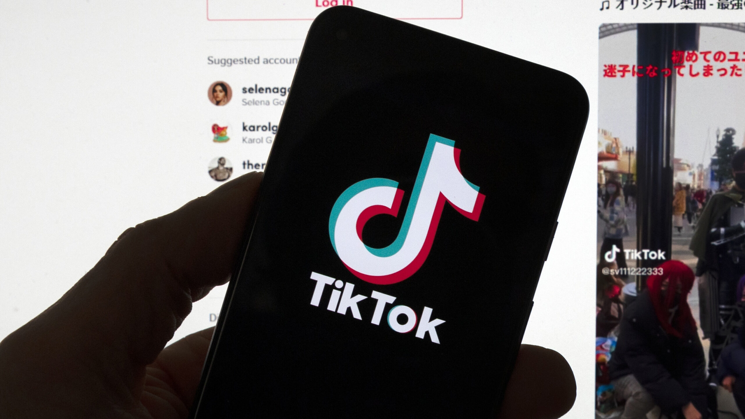 tiktok logo is shown, kids' social media use is under scrutiny from health officials...